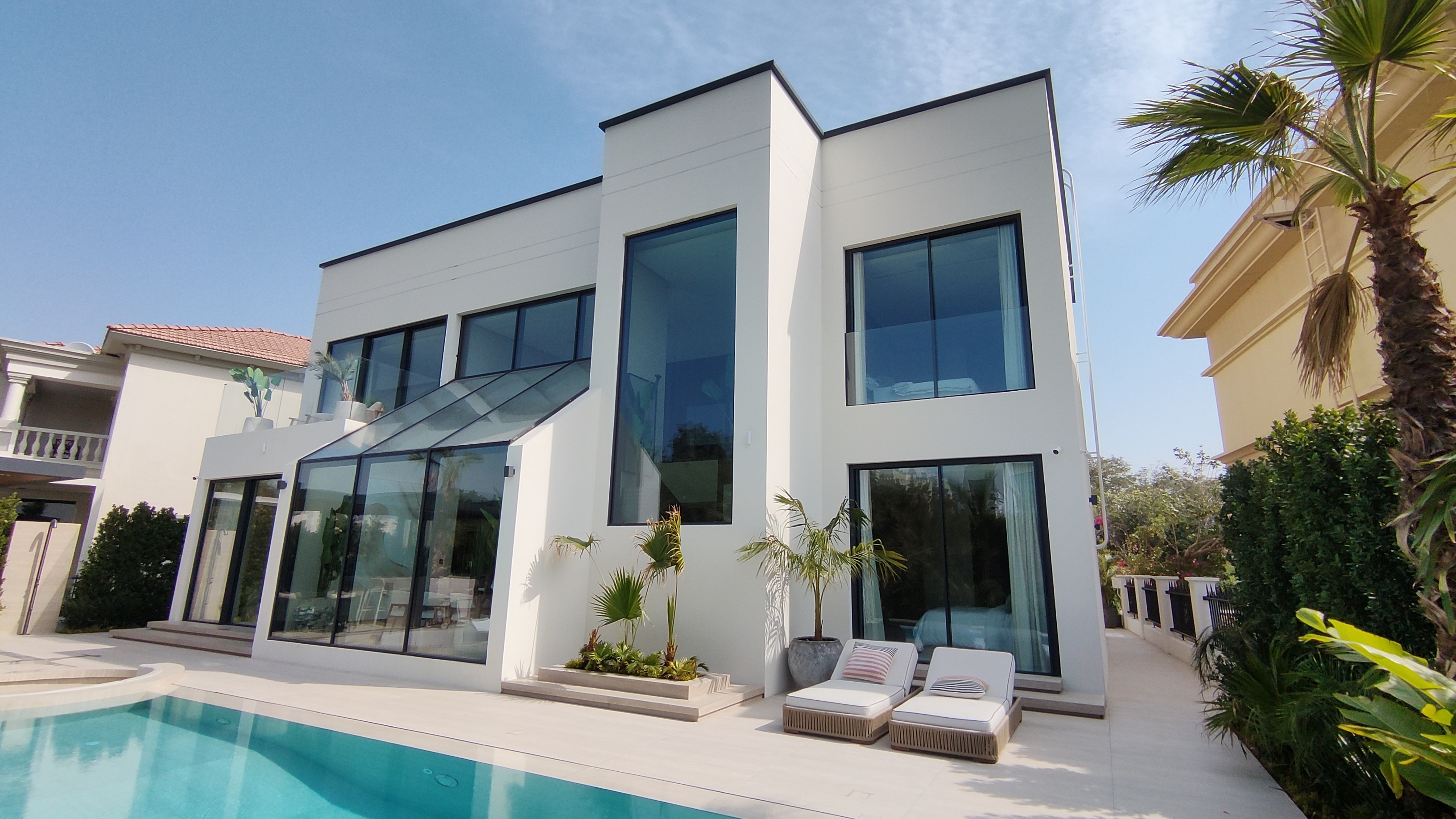 Modern villa with pool and full-height glazing