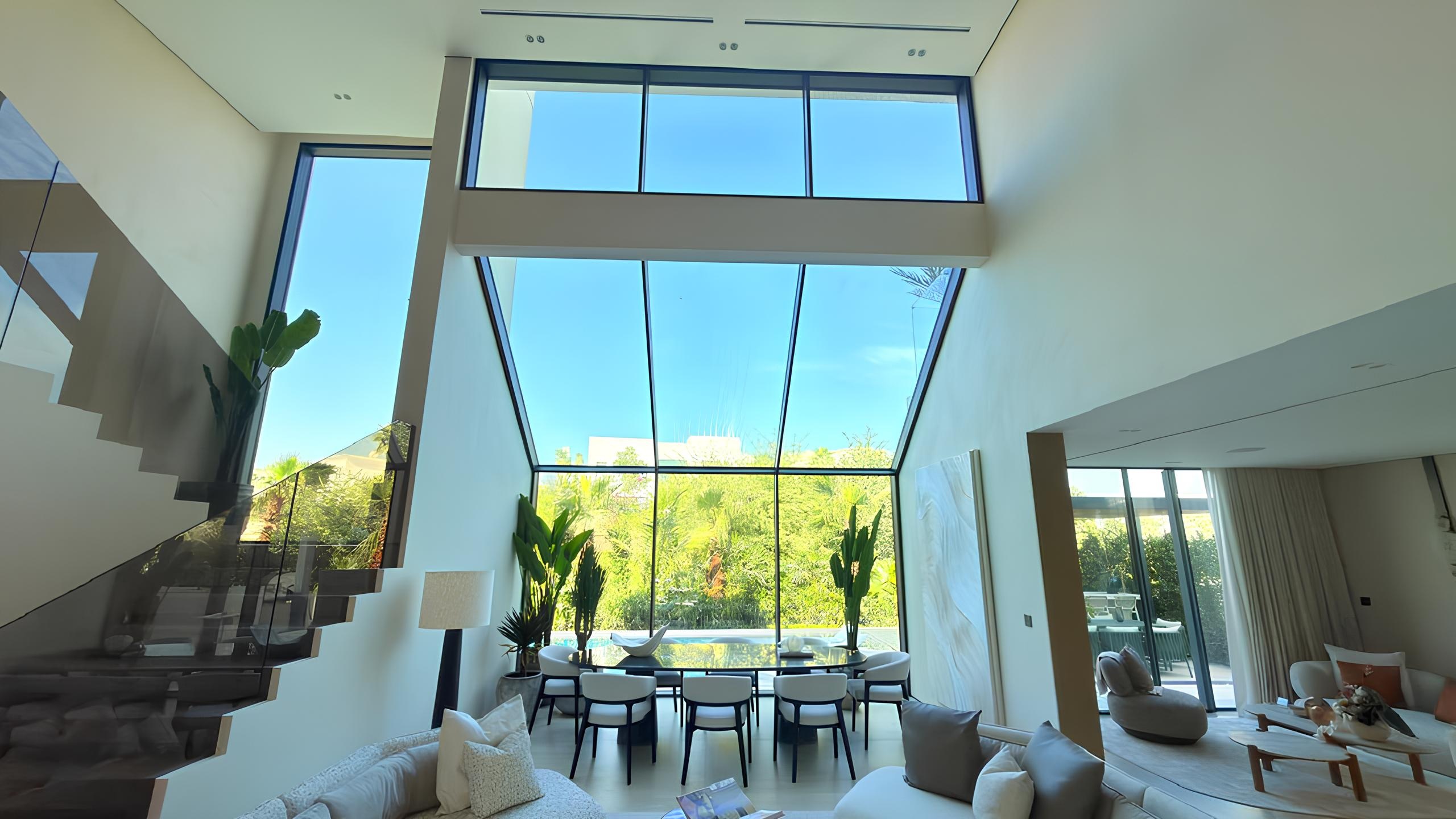 Double-height glass living room