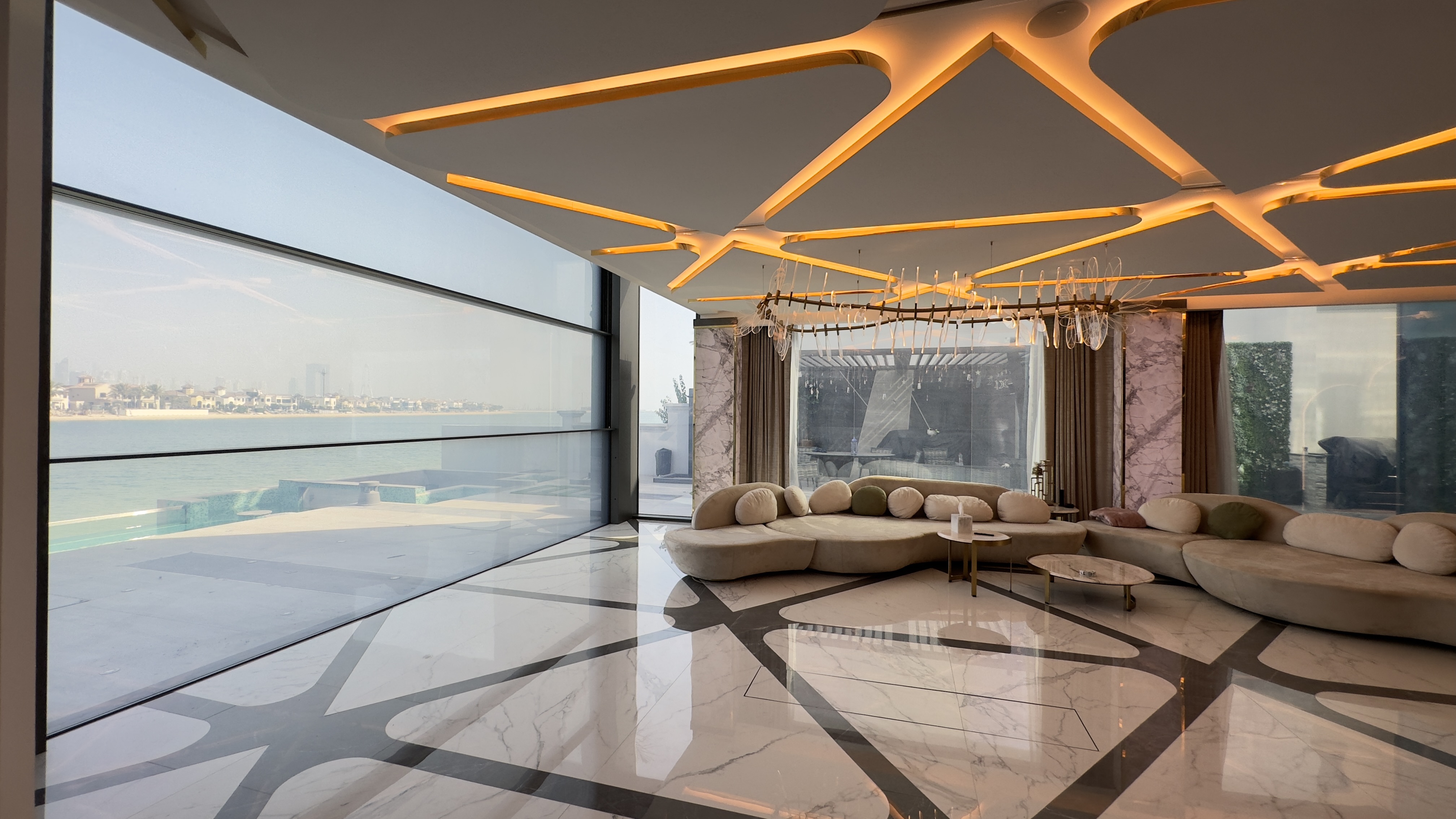 Waterfront lounge with sculpted ceiling