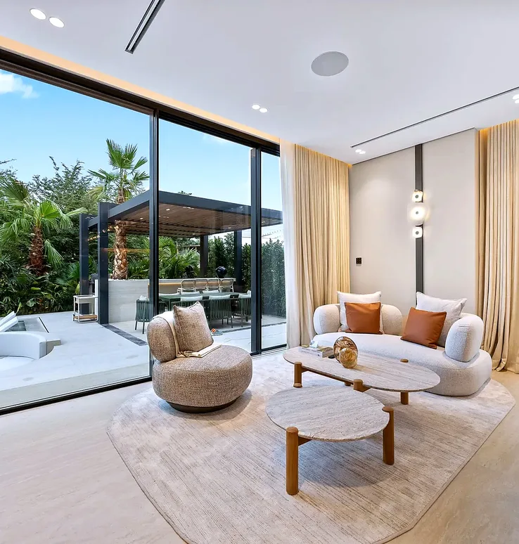 Jumeirah Islands living room with large sliding glass opening to the garden